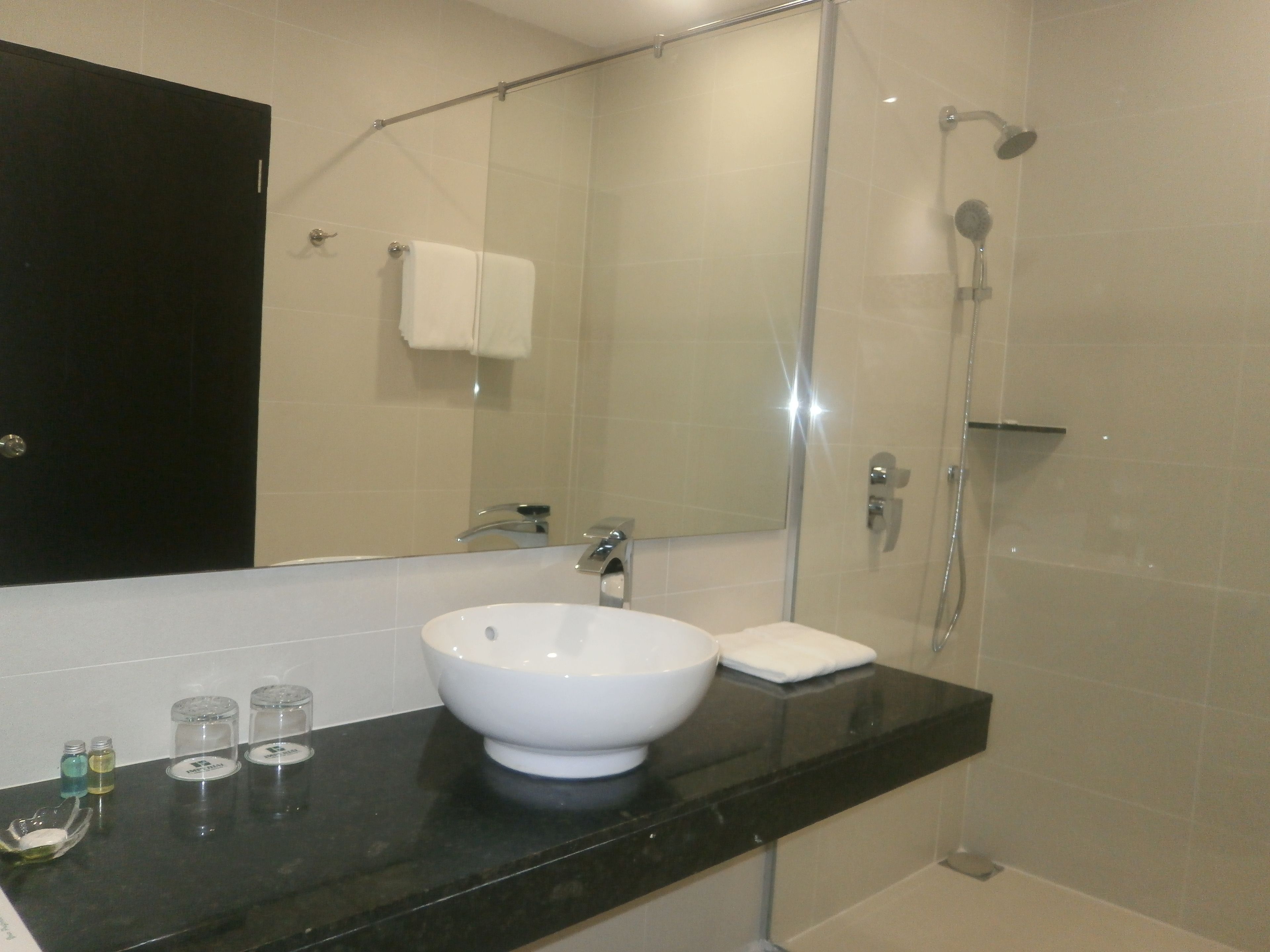 premium chalet | bathroom | shower, free toiletries, hair dryer, slippers