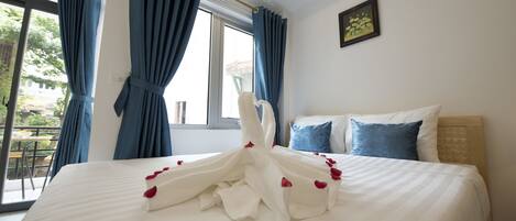 Deluxe Double or Twin Room, Balcony | Minibar, in-room safe, desk, free WiFi