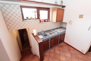 Departamento, 3 habitaciones | Cocineta privada | Refrigerador, parrilla de estufa y tetera eléctrica