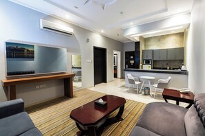 Apartment, 1 Bedroom | Hypo-allergenic bedding, in-room safe, desk, iron/ironing board - Taleen Serviced Apartments AlSahafa (Riyadh)