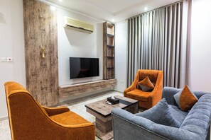 Apartment, 1 Bedroom | Living area | LCD TV - Taleen Serviced Apartments AlSahafa (Riyadh)