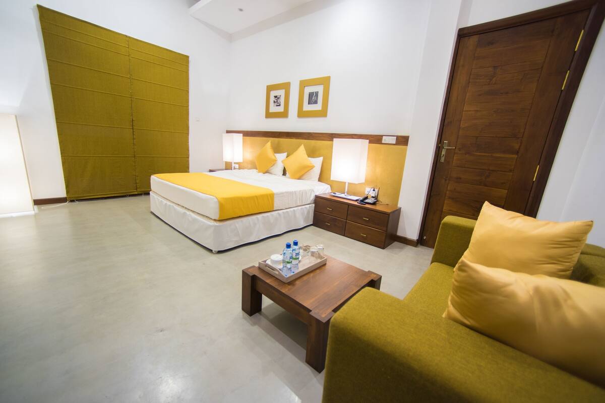 Deluxe Triple Room, 1 King Bed, City View, Garden Area | Premium bedding, in-room safe, desk, blackout curtains