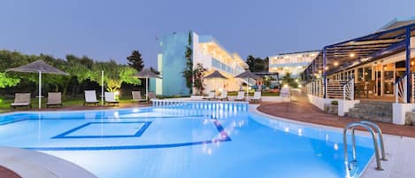 Seasonal outdoor pool, pool umbrellas, pool loungers