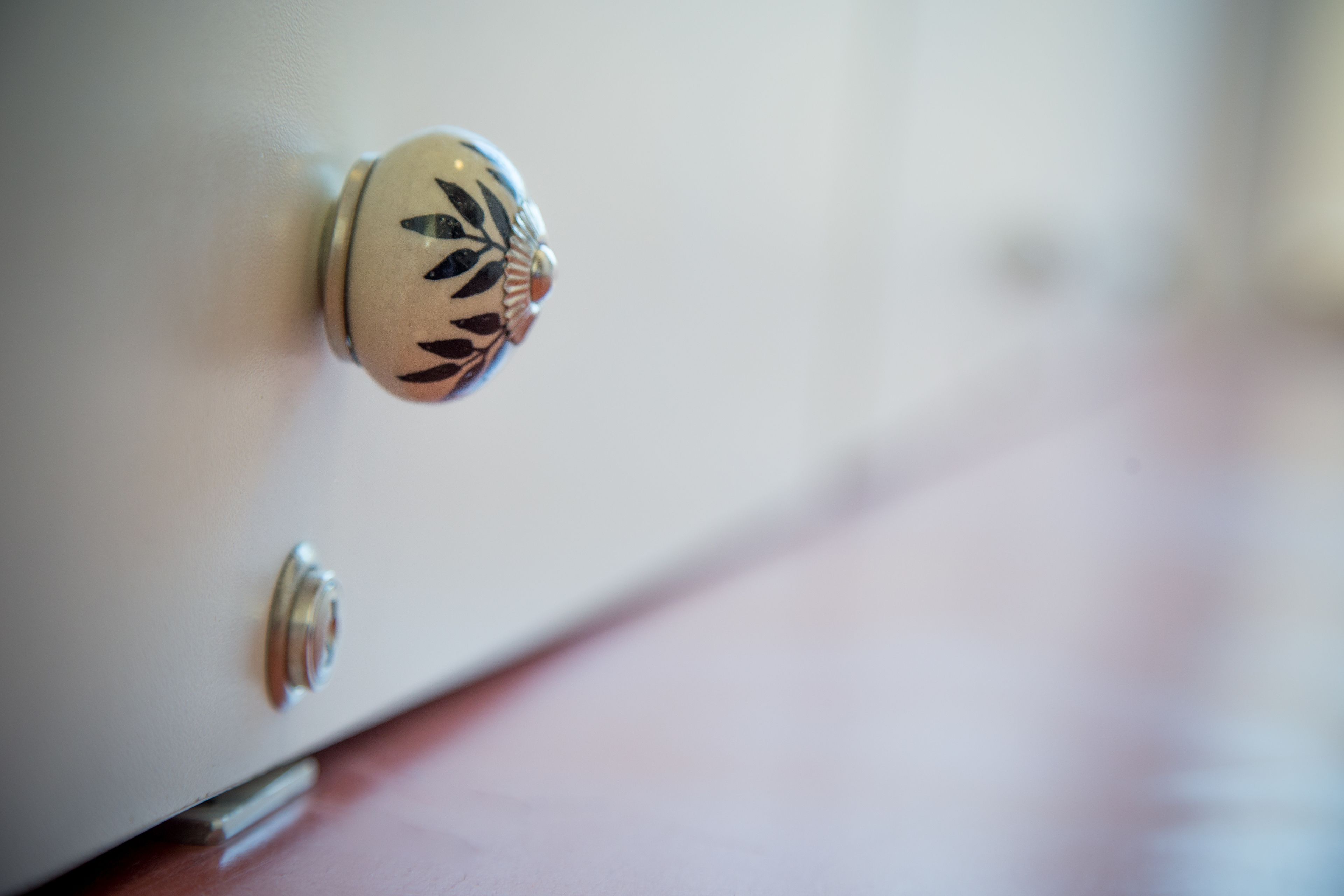 A door handle with a decorative design.