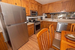 Condo, 2 Bedrooms | Private kitchen | Full-size fridge, microwave, oven, stovetop