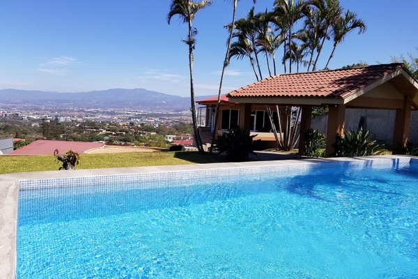 Outdoor pool, pool umbrellas, pool loungers