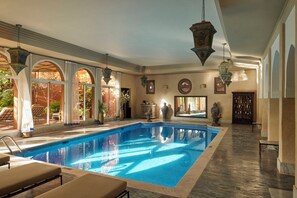 Relax by the pool with lounge chairs and take in the view of the sparkling water.