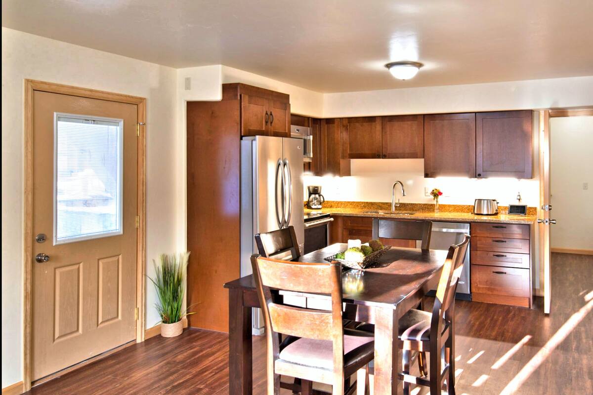 Romantic 1- Bedroom Condo with Full Kitchen | Private kitchen | Full-size fridge, microwave, oven, stovetop