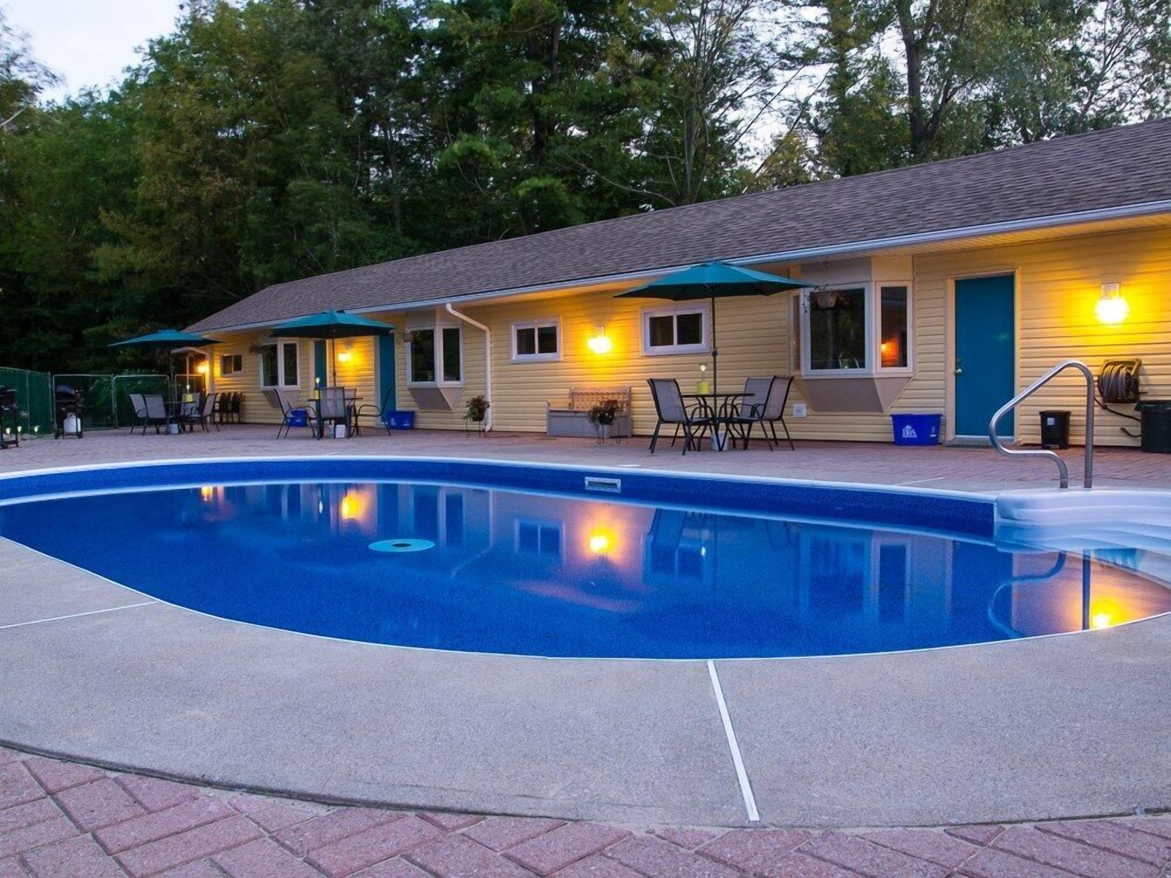 Seasonal outdoor pool, pool umbrellas, pool loungers