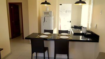 Deluxe Duplex | Private kitchen | Fridge, microwave, oven, blender