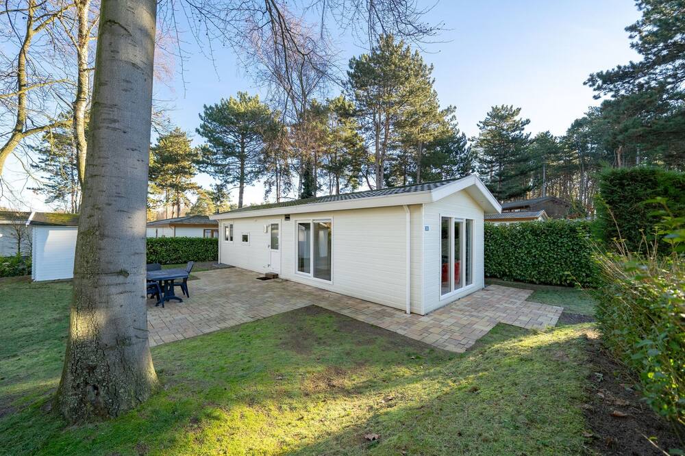 Chalet with garden, near Brunssummerheide