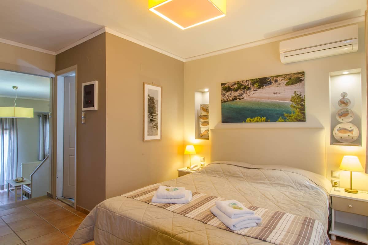 Apartamento superior | Caja fuerte, escritorio, cortinas opacas y sistema de insonorización