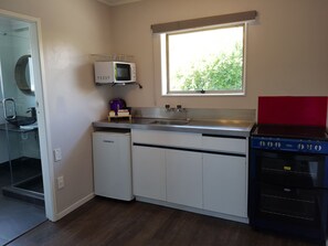 Kamar Double Keluarga, 2 kamar tidur | Dapur pribadi | Lemari es, microwave, oven, dan kompor