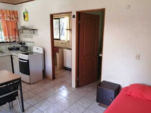 Standard Villa, 1 Bedroom, Kitchen, Partial Sea View | Private kitchen | Full-sized fridge, microwave, stovetop, coffee/tea maker - Cahuita Lodge (Cahuita)