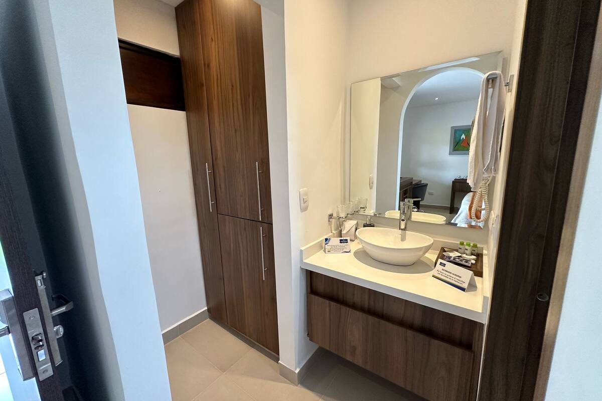 junior double room | bathroom | shower, free toiletries, hair dryer, towels