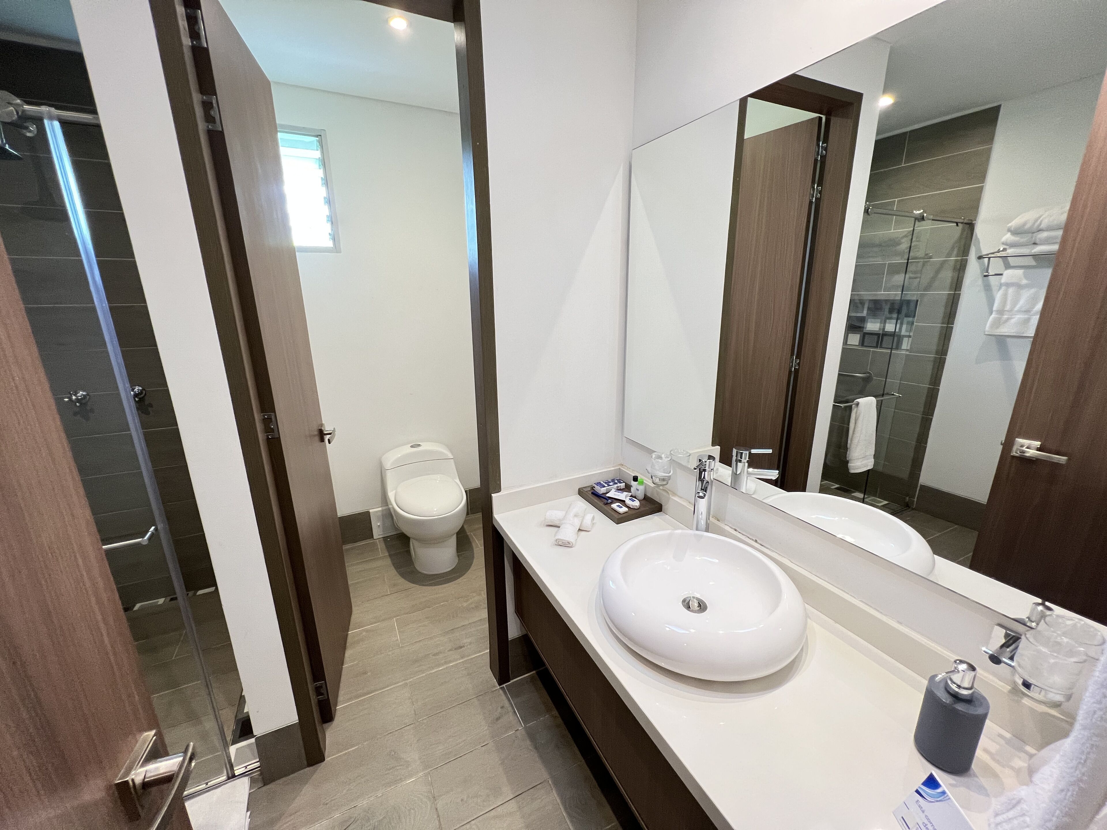 superior quadruple room | bathroom | shower, free toiletries, hair dryer, towels