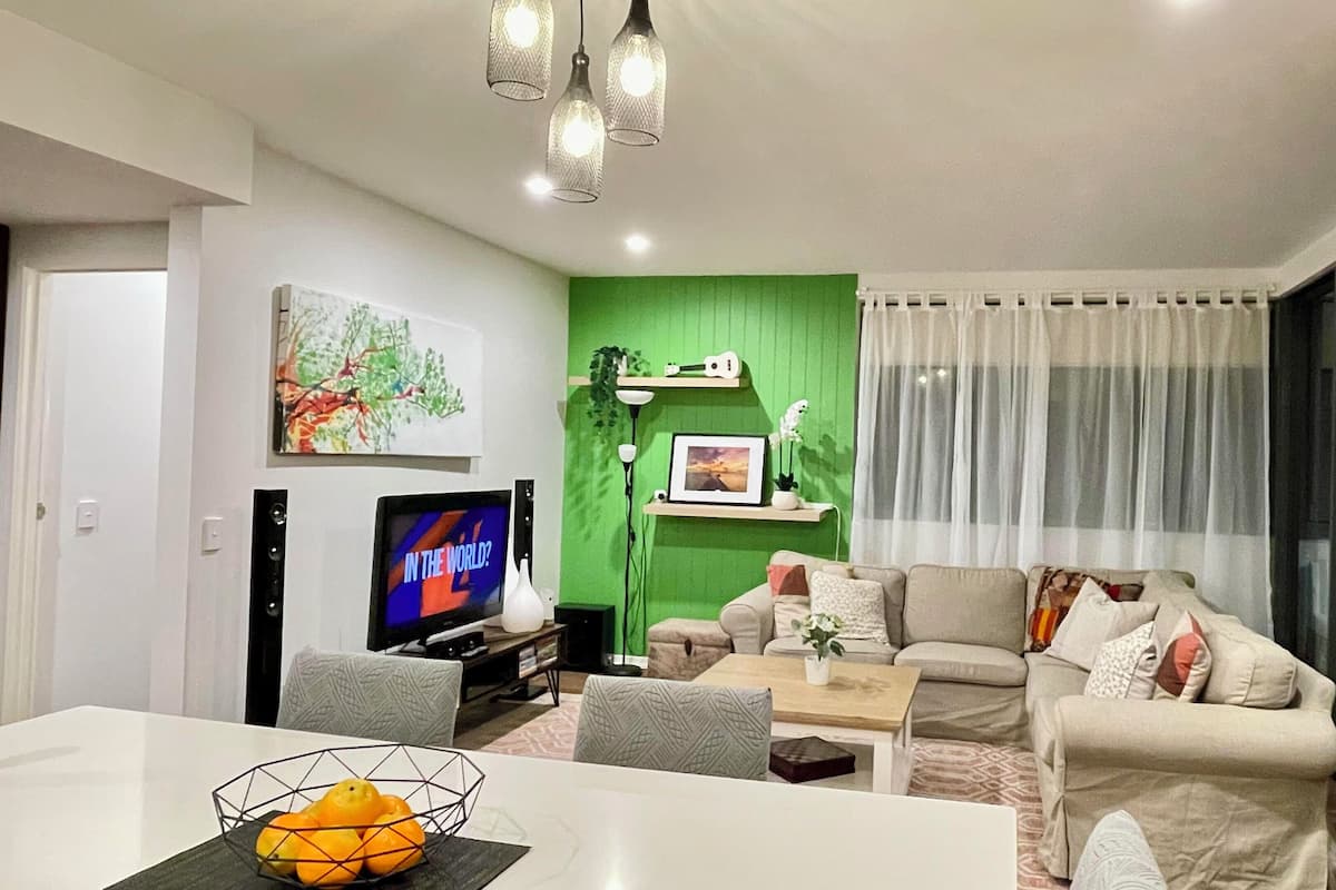 3 Bedroom Apartment | Living area | 32-inch flat-screen TV with satellite channels, TV, pay movies