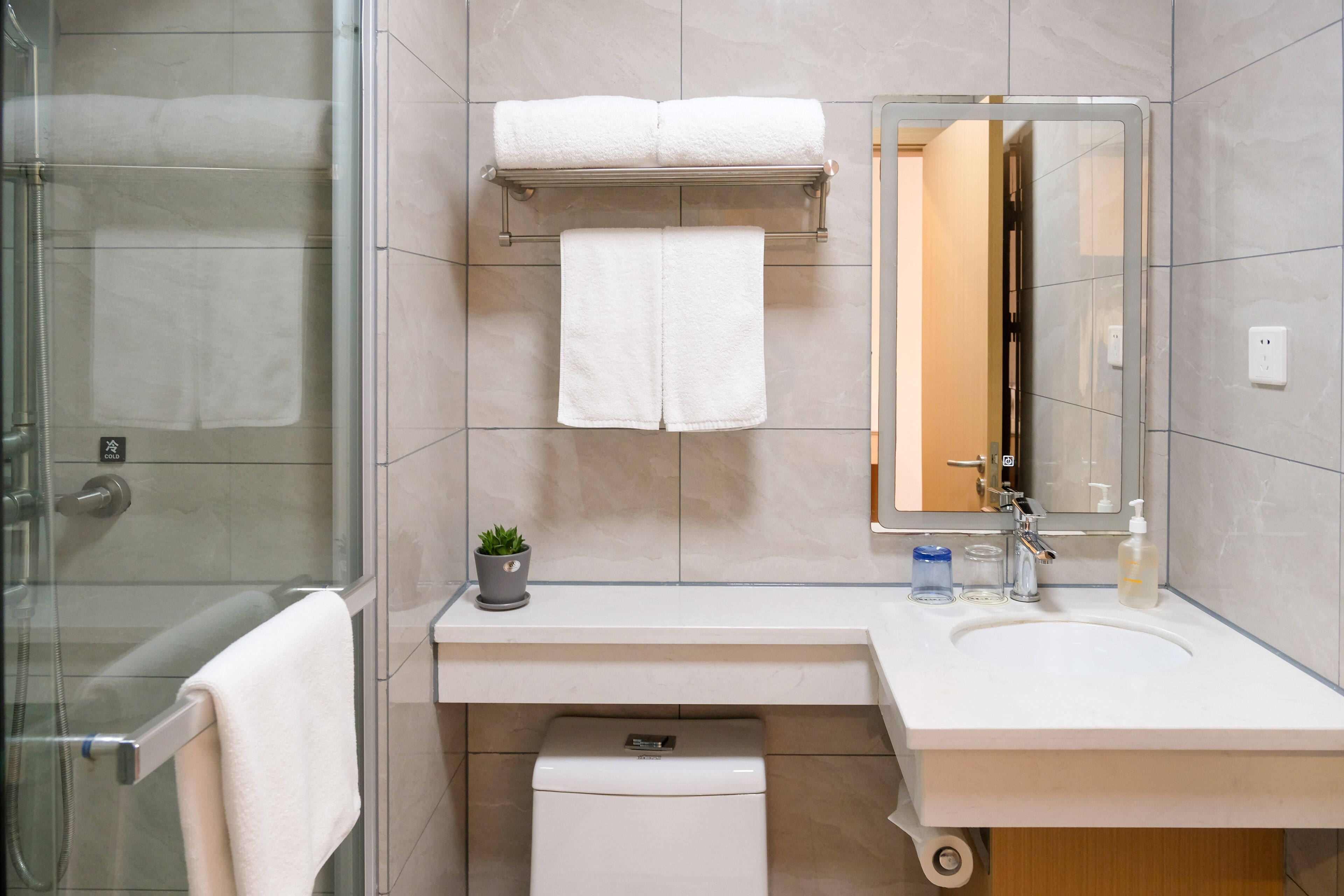 shower, free toiletries, hair dryer, slippers