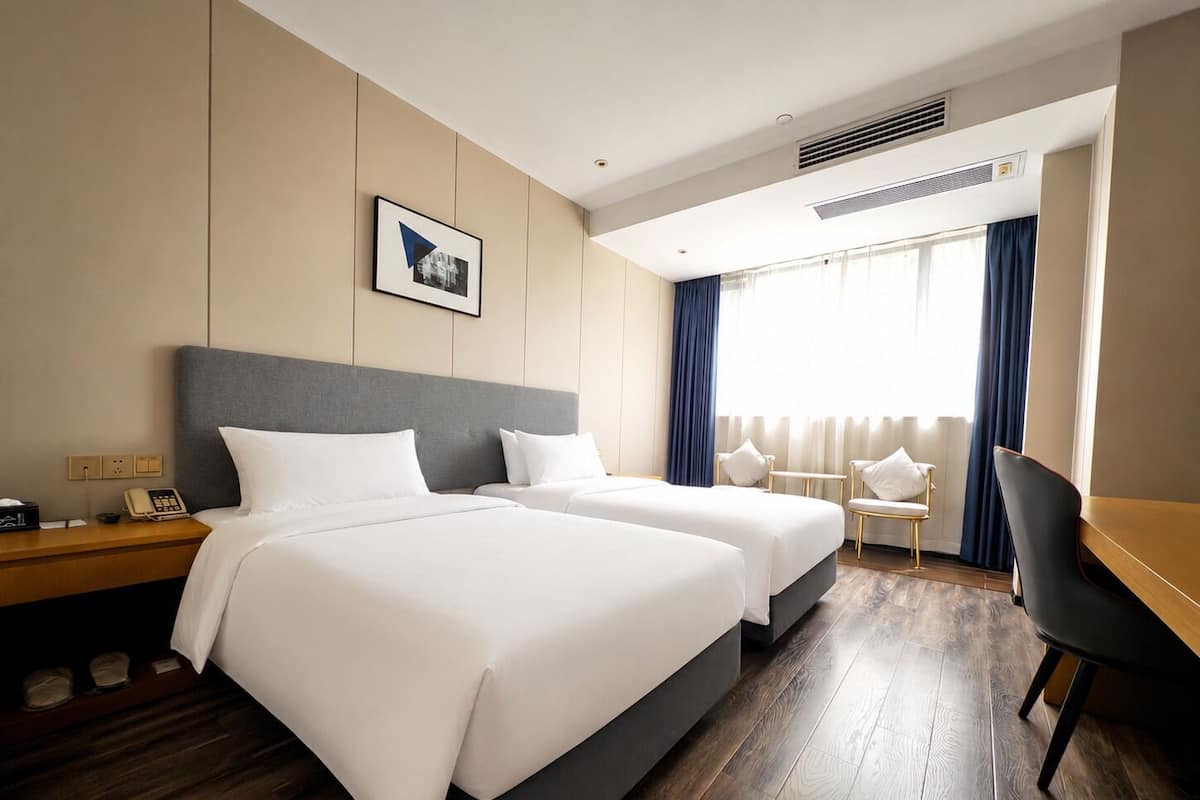 Standard Twin Room | Desk, blackout drapes, cribs (free), WiFi (free)