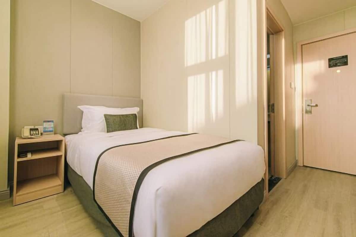 Desk, blackout drapes, cribs (free), WiFi (free)