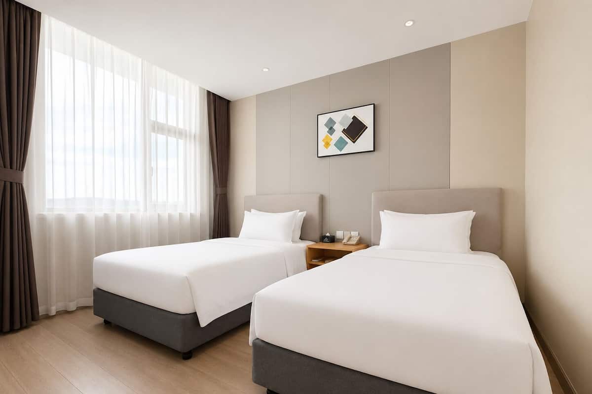 Deluxe Twin Room, 2 Twin Beds | Desk, blackout drapes, cribs (free), WiFi (free)