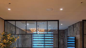 Royal Suite | Living area | Flat-screen TV, heated floors
