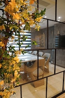 Royal Suite | Living area | Flat-screen TV, heated floors