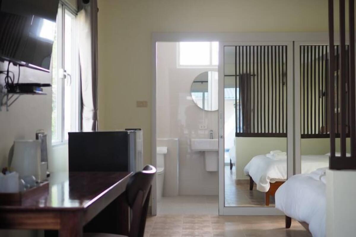 Free minibar items, in-room safe, desk, laptop workspace