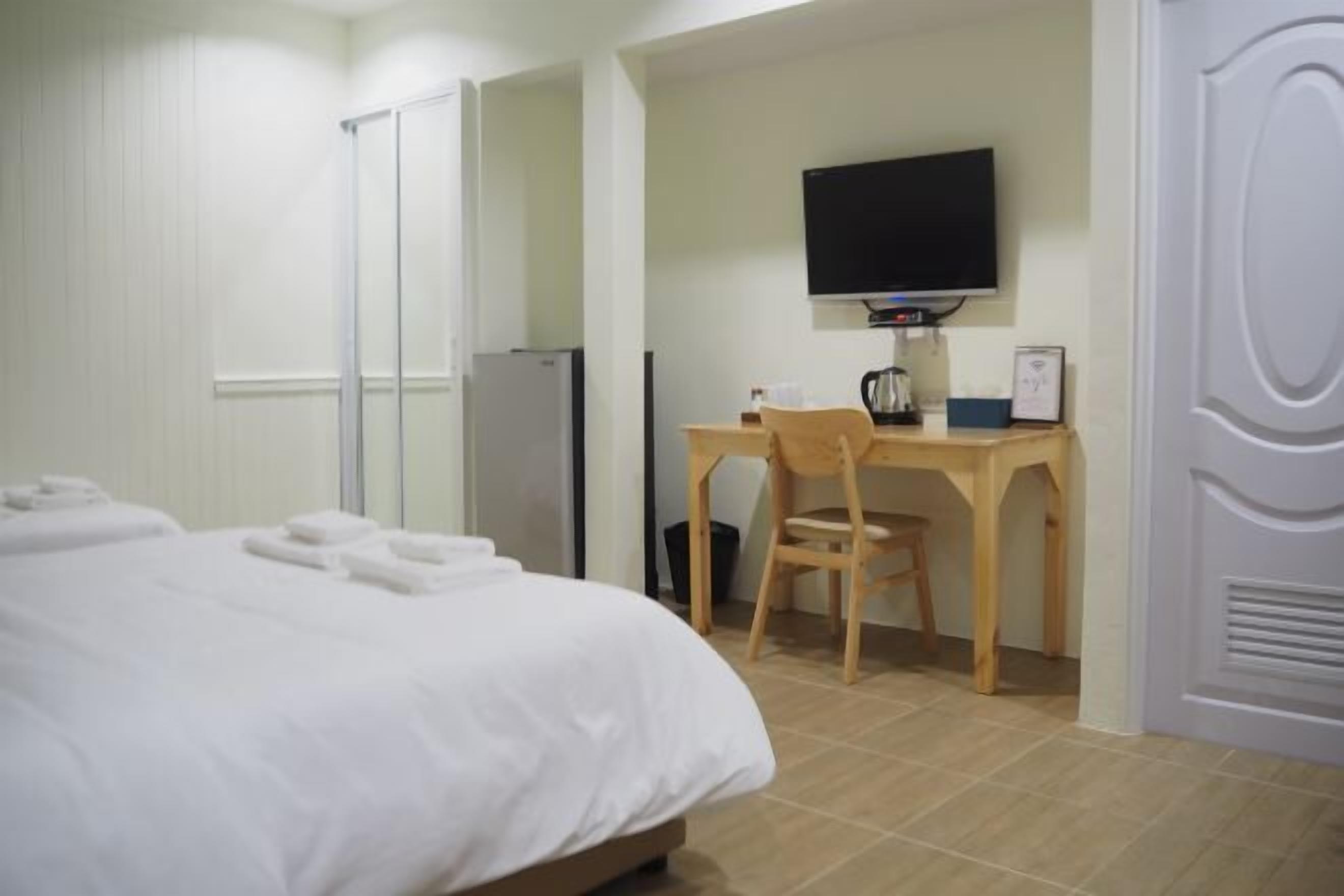 Free minibar items, in-room safe, desk, laptop workspace