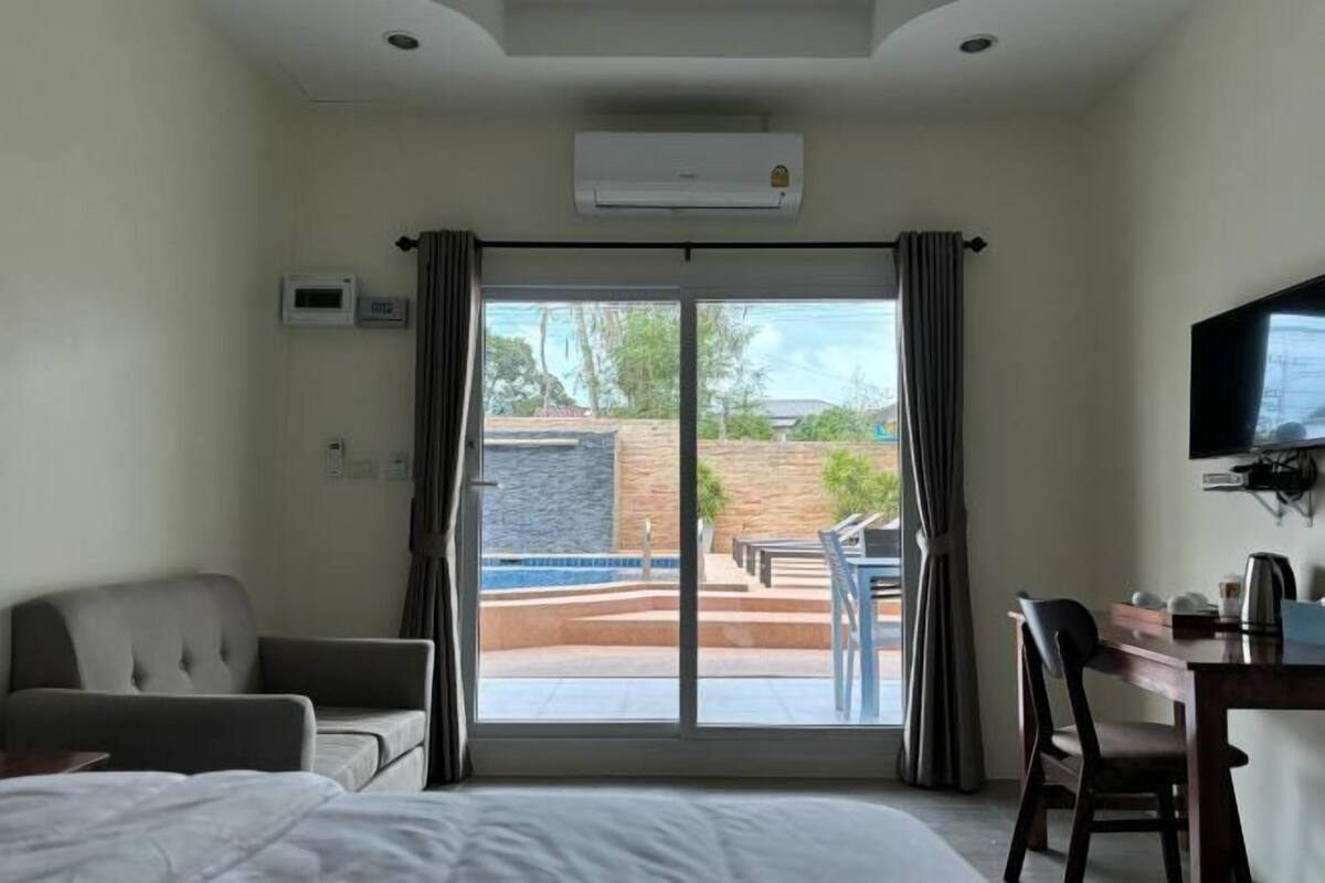 Free minibar items, in-room safe, desk, laptop workspace