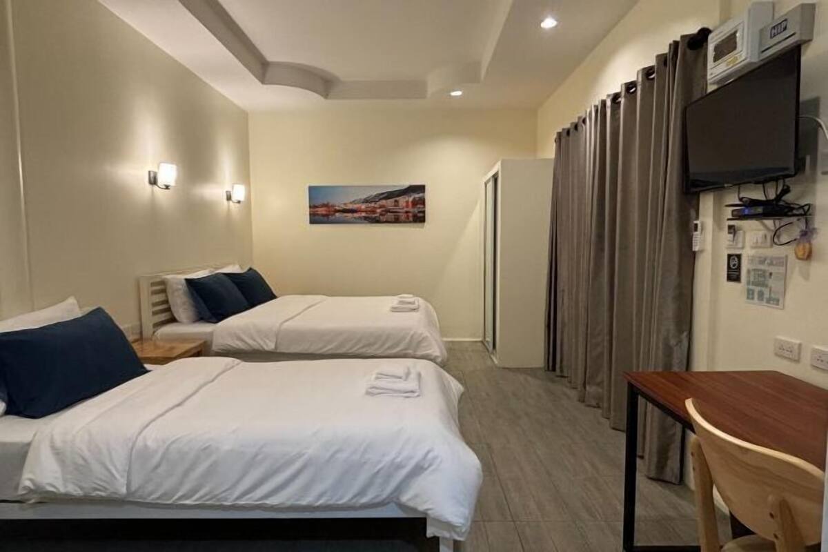 Free minibar items, in-room safe, desk, laptop workspace