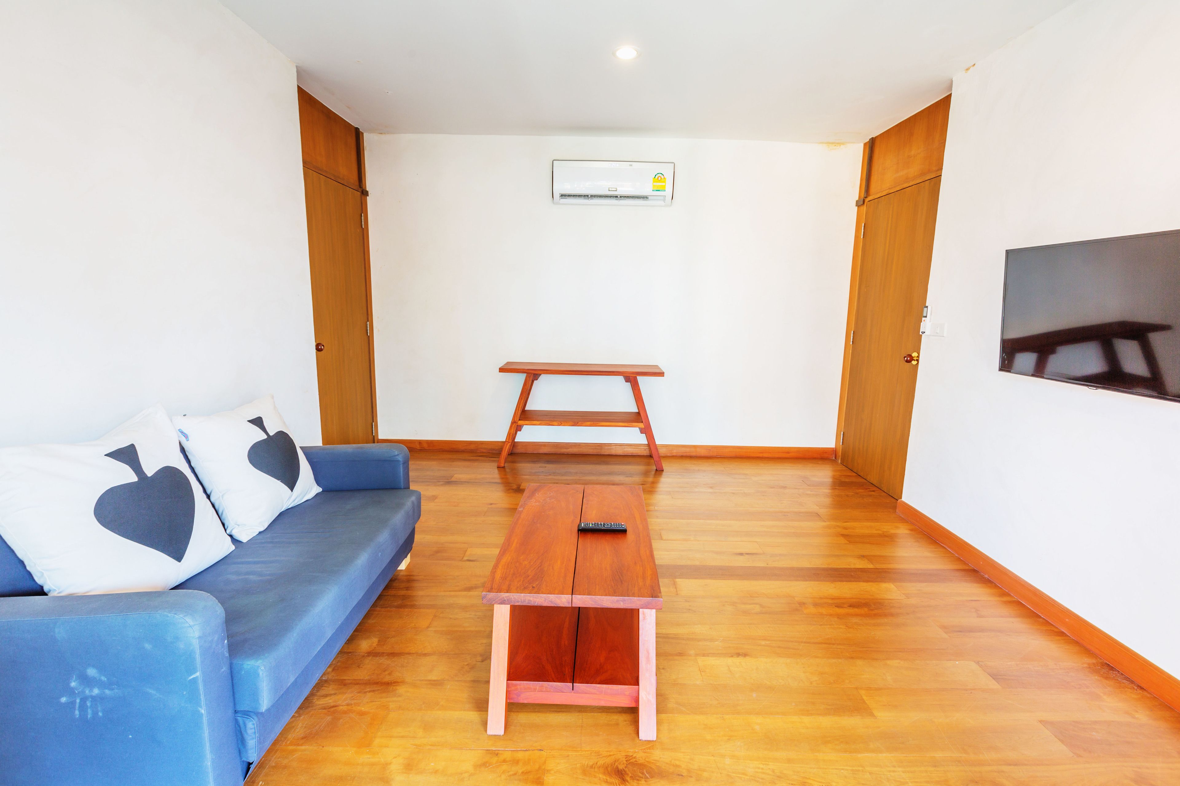 deluxe family villa | living area | lcd tv