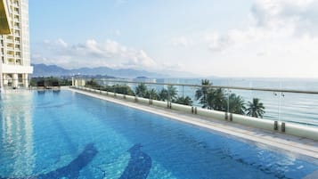 Outdoor pool, pool umbrellas, pool loungers
