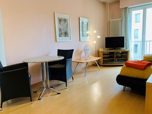 Deluxe Apartment, 1 Bedroom | Living area | Flat-screen TV - Apartments zum Löwen (Lucerne)