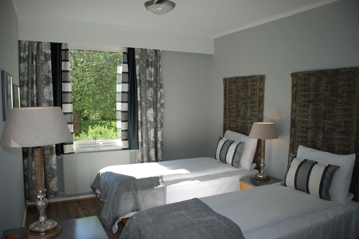 Pillow-top beds, desk, blackout curtains, free WiFi