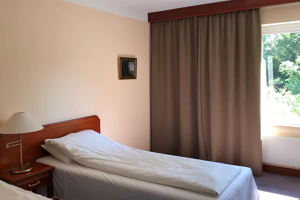 Pillow-top beds, desk, blackout curtains, free WiFi