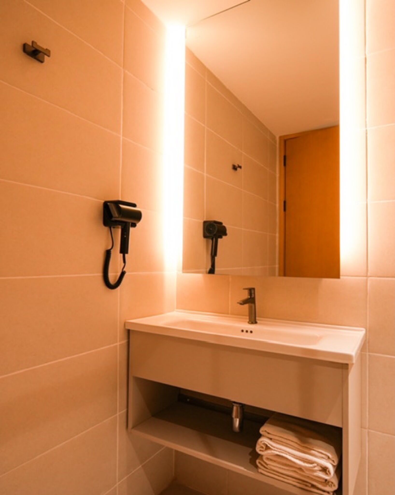 deluxe double queen | bathroom | shower, rainfall showerhead, free toiletries, hair dryer