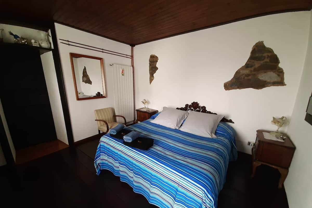 Double Room, Private Bathroom (Mughetto) | Individually decorated, individually furnished, blackout curtains