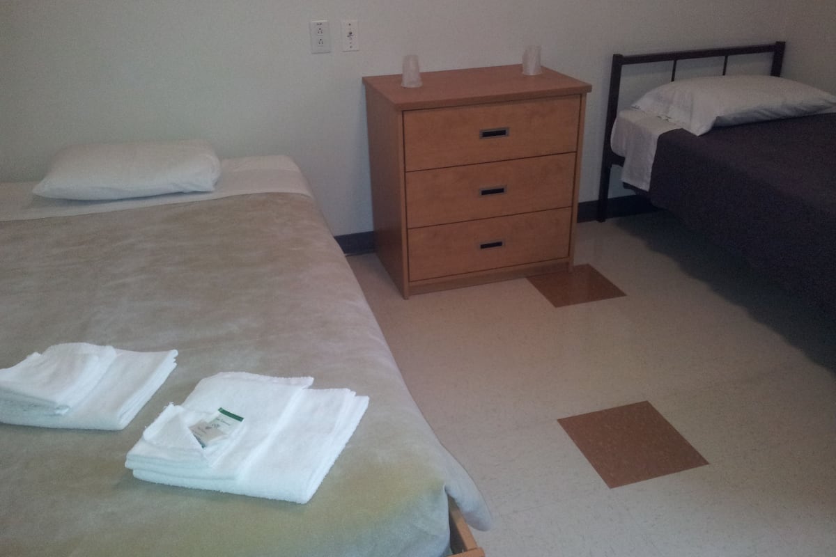 family studio, 2 bedrooms, refrigerator & microwave (could be located in basement) | desk, free wifi, bed sheets