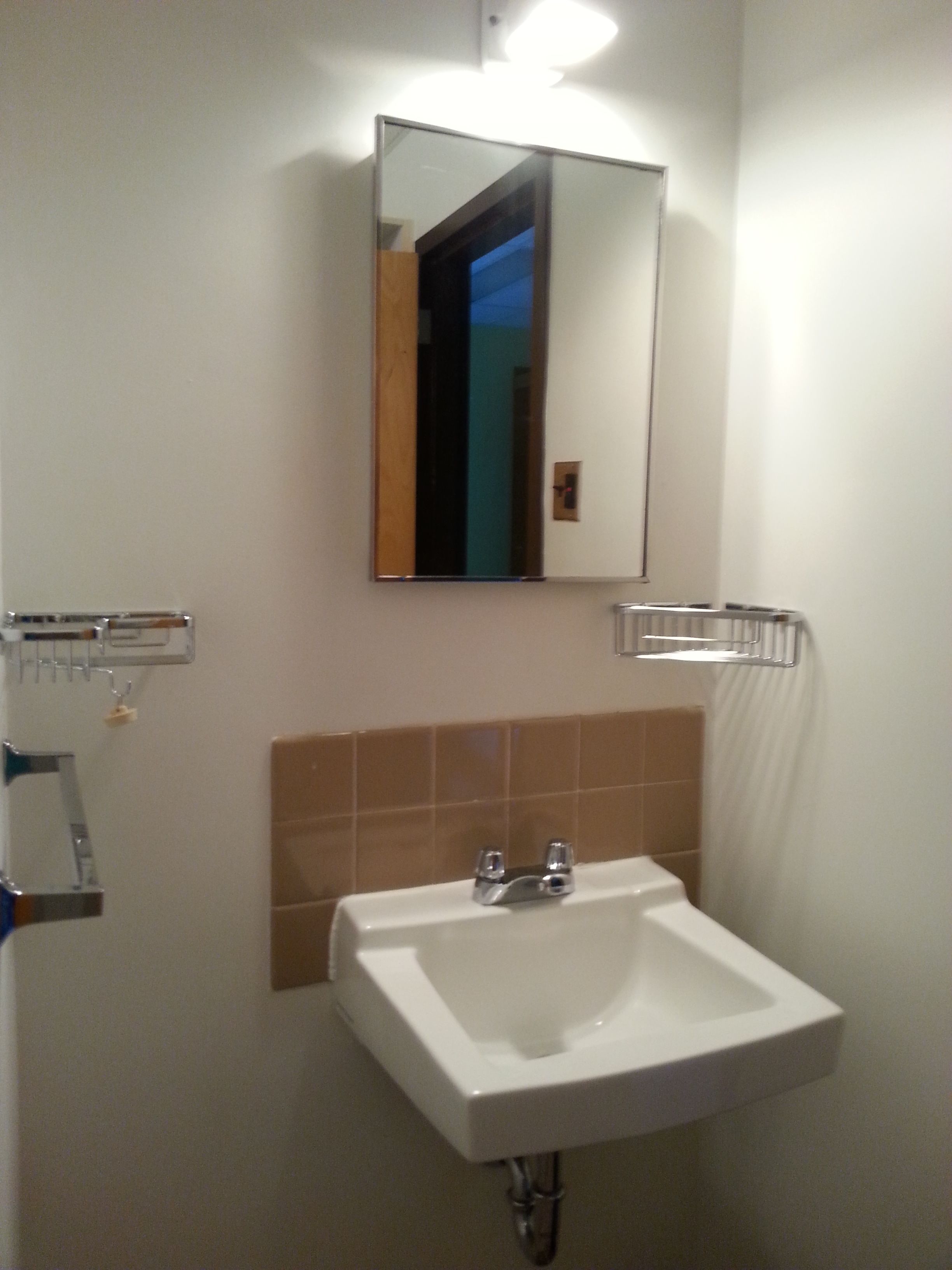 basic studio, 1 single bed, refrigerator & microwave | bathroom | free toiletries, towels