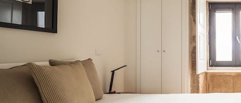 Family Apartment, 2 Bedrooms, Patio, Ground Floor (InSitu Trindade - City Life) | Individually decorated, individually furnished, desk, blackout drapes