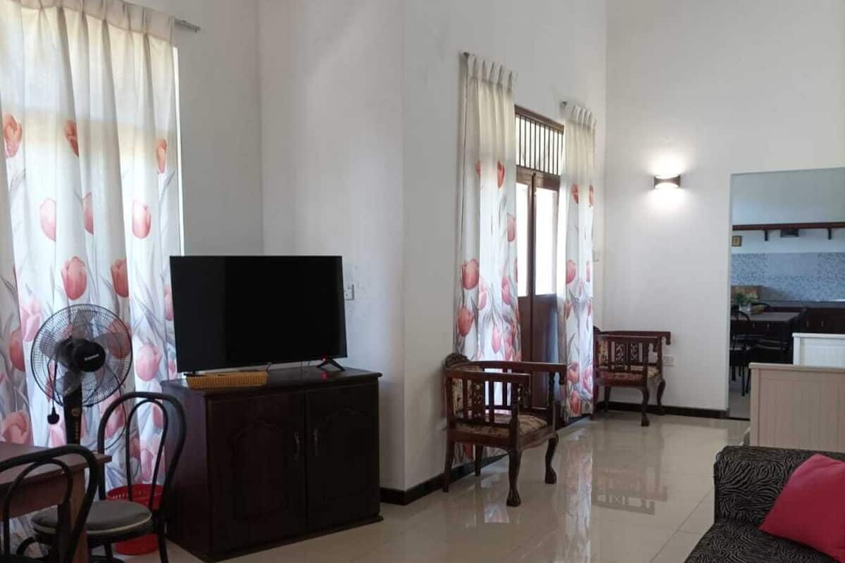 Family Apartment | Living area | 36-inch LCD TV with cable channels, TV, pay movies
