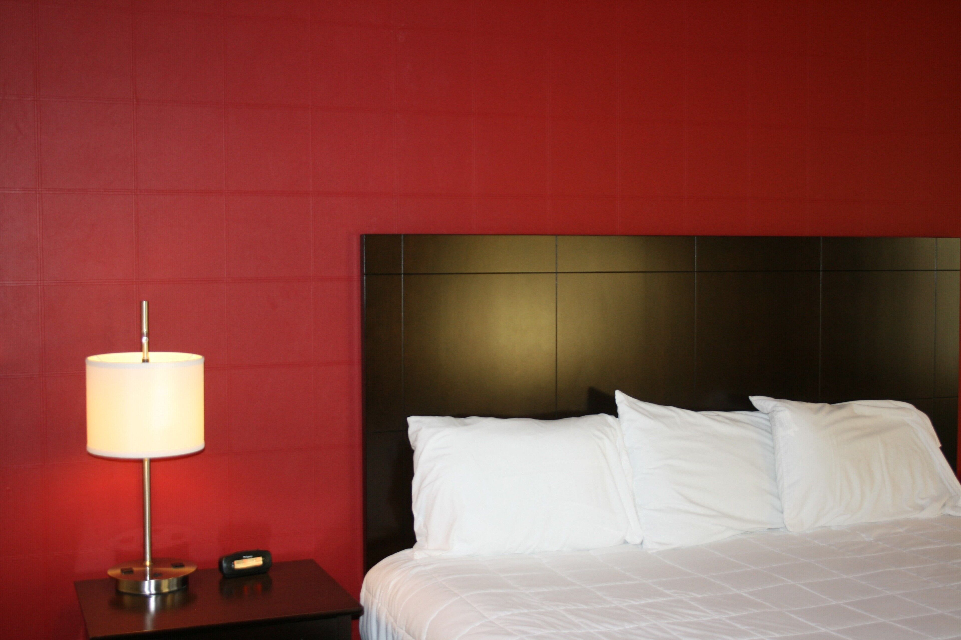deluxe room, 1 king bed, kitchenette | desk, laptop workspace, free wired internet, bed sheets