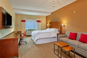 Ropa de cama de alta calidad y caja de seguridad en la habitación