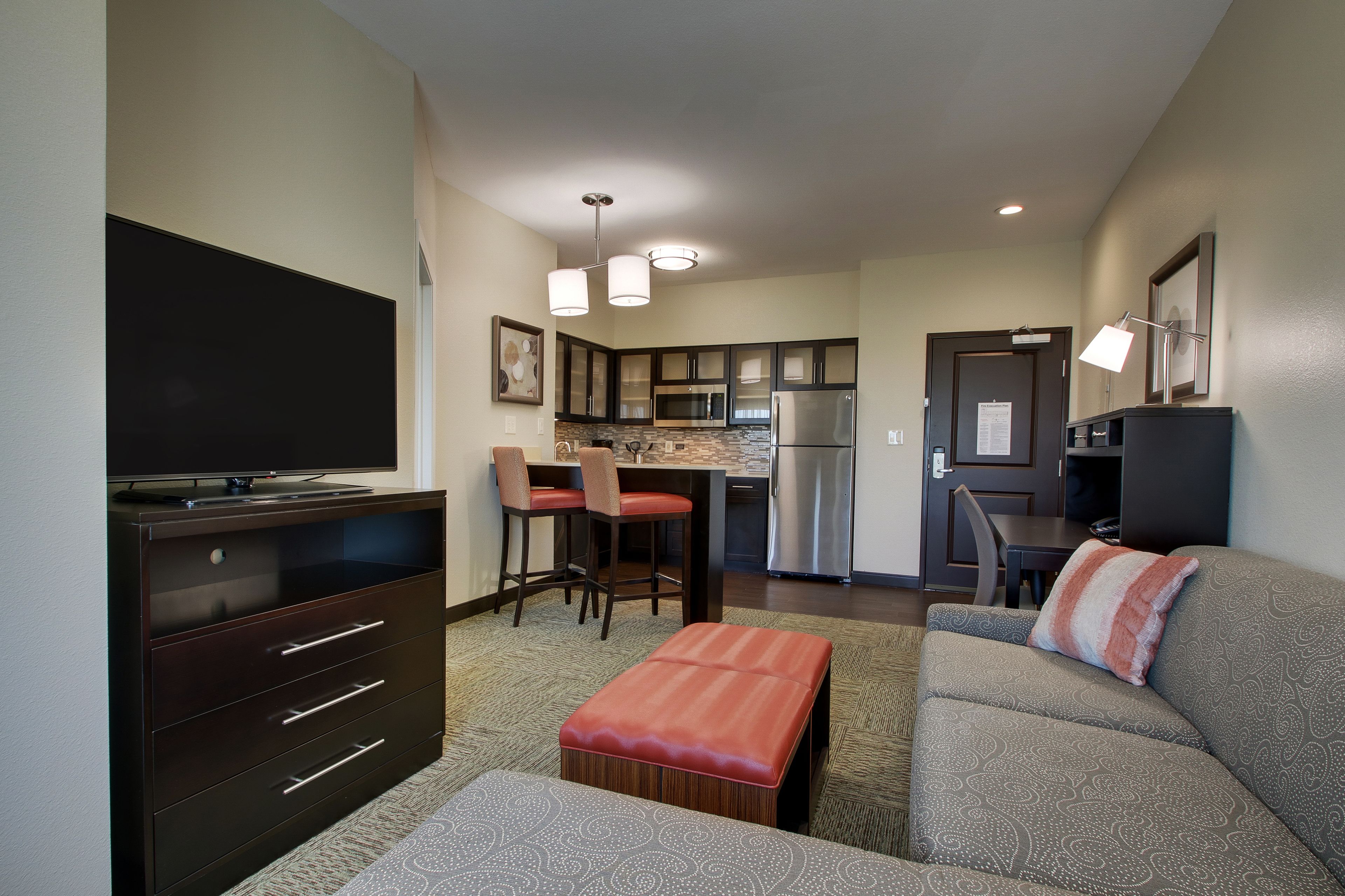Premium bedding, desk, laptop workspace, soundproofing