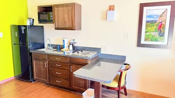 Fridge, microwave, stovetop, coffee/tea maker
