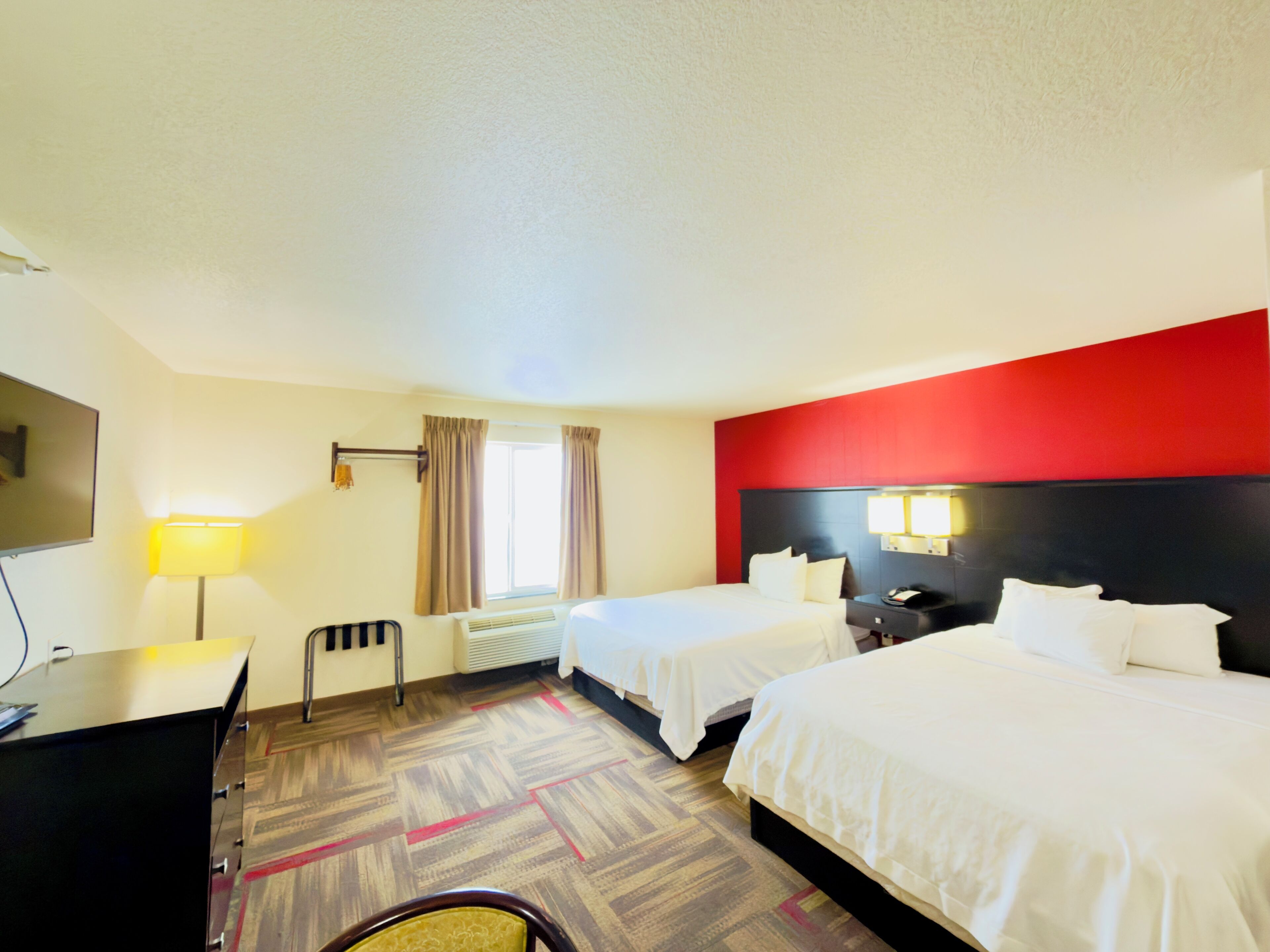 Suite, 2 Queen Beds, Non Smoking, Kitchenette | Desk, laptop workspace, blackout drapes, iron/ironing board