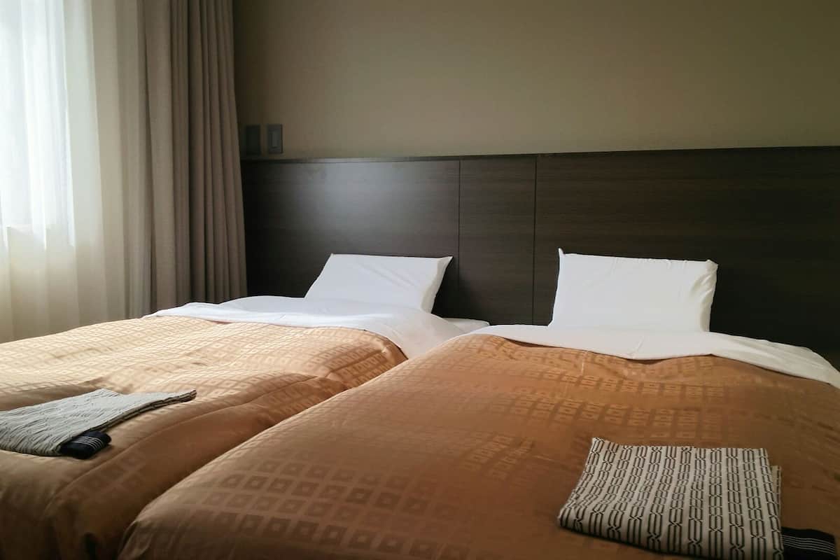 Premium bedding, desk, free WiFi, bed sheets