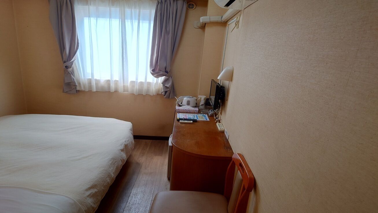 Desk, blackout drapes, iron/ironing board, free WiFi