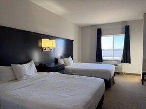 Suite, 2 Queen Beds, Kitchenette | Desk, laptop workspace, blackout drapes, soundproofing - Black Gold Suites Stanley (Stanley)
